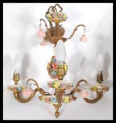 A vintage Italian floral encrusted crystal and brass three branch ceiling light chandelier having