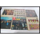 A good collection of long play LP vinyl record albums by The Rolling Stones to include Stoned Alive,