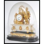 A 19th century French gilt mantel clock surmounted with a classical figure. Housing a Japy Freres