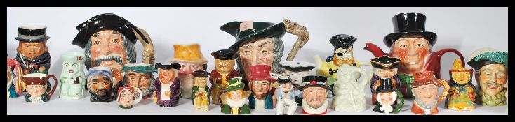 A collection of toby - character jugs to include Royal Doulton Red Piper, Mad Hatter etc along