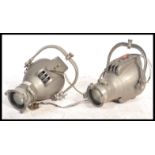 A pair of vintage 20th Century theatre / stage lights possibly by strand lighting of usual form,