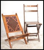 A 20th Century contemporary folding Congo chair, having a geometric panel to the back of the chair