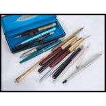 A collection of vintage 20th Century Parker fountain pens, Parker ball point pens, propelling