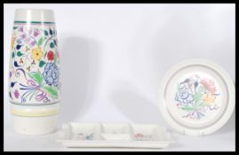 A large 20th century Poole Pottery vase together with a similar plate and a matching hors d'