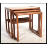 A G-Plan retro teak wood 1970's graduating nest of tables in the Quadrille pattern. The tables