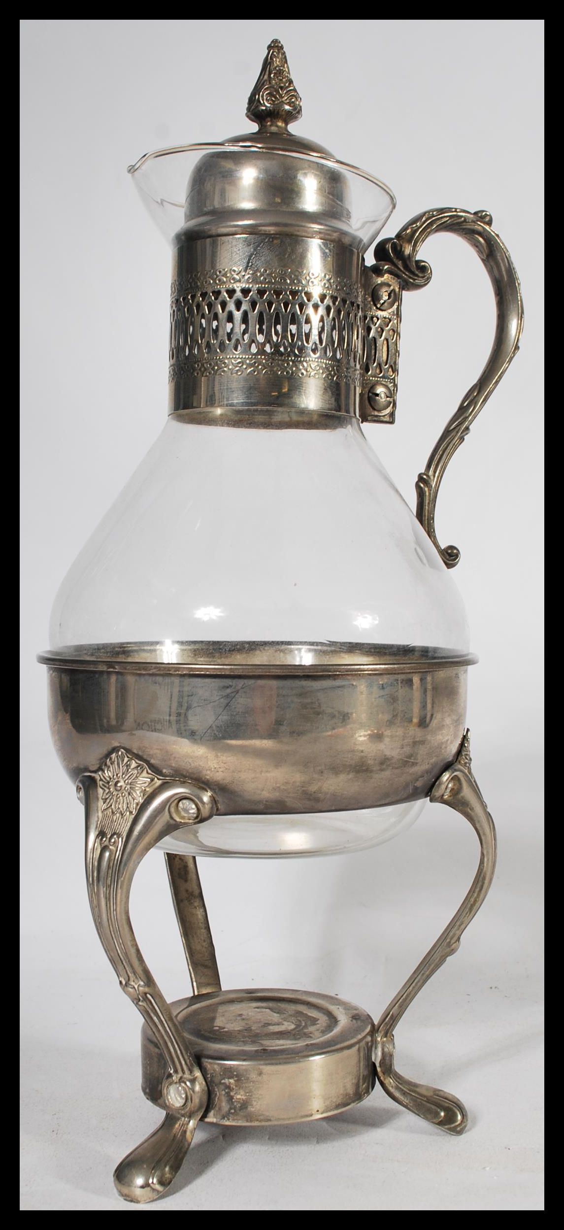 A vintage 20th Century silver plated and glass coffee carafe spirit warmer