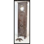 A 19th century French chestnut / oak large Breton compoise longcase clock having  oversized trunk