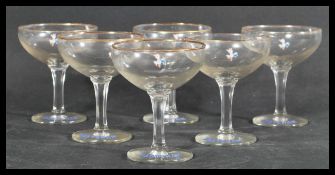 A collection of six vintage 20th Century Babycham advertising, point of sale glasses. Each glass