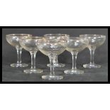 A collection of six vintage 20th Century Babycham advertising, point of sale glasses. Each glass