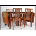 A retro 20th Century G-Plan dining table suite com