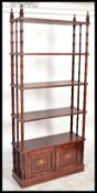 A 20th Century hardwood brass inlaid decorated bookcase whatnot / display shelving unit, a series of