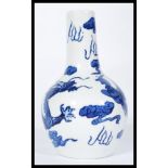 A 19th century blue and white Chinese baluster vase. The bulbous body having elongated neck with