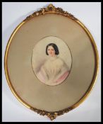 A 19th century Victorian watercolour portrait study / painting of a young lady being set within an