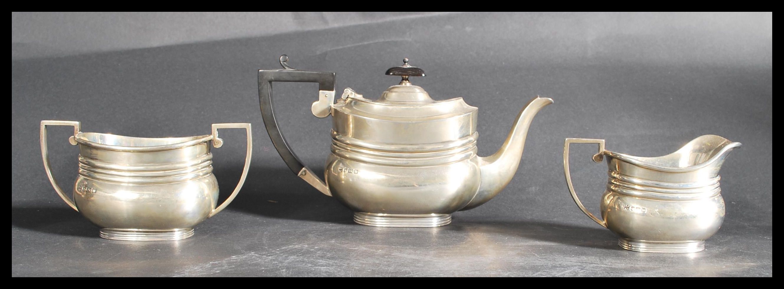 A silver hallmarked three piece tea service by For - Image 3 of 9