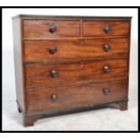 A 19th century mahogany Georgian chest of drawers being raised on bracket feet with 2 short over 3