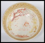 A very large 19th century English ceramic centerpiece fruit bowl painted in the Chinese taste with