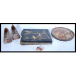 A collection of Chinese items dating from the 19th Century to include a pair of leather slippers,