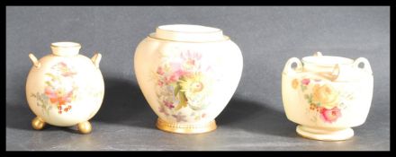 A group of three Royal Worcester ivory blush pieces to include a four handled vase shape 991 c1898 ,