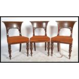 A Set of three William IV Mahogany Dining Chairs, 2nd quarter 19th century,  with curved top rails