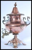 A late 19th Century copper and brass samovar, the inverted circular body surmounted by a circular