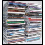 A collection of Compact Discs CD's featuring several artists and genres to include Dave Brubeck,