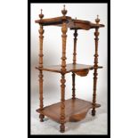 A 19th Century Victorian walnut and marquetry inlaid three tier etagere / wotnot inlaid with