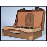 A gents vanity travelling suitcase / case fully appointed having various white metal topped glass