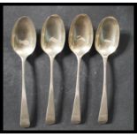A set of four 18th century Georgian silver table spoons by William Sumner & Richard Crossley. All in