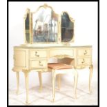 A 19th century style Louis style mirror back dressing table having a triptych mirror raised above