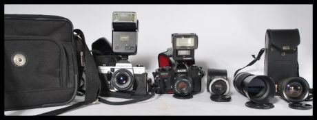 A collection of camera equipment from the 20th century to include Tamron  Zoom 1:3.8 80-210mm