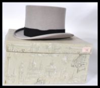 A vintage mid 20th Century Ascot Grey Morning Top Hat by Harrods, size 6 7/8 together with gloves,