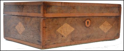 A 19th century Victorian walnut work box having a