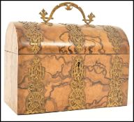 A 19th century walnut dome topped stationary box h