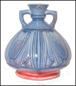 A  Royal Worcester pottery twin handled vase in th