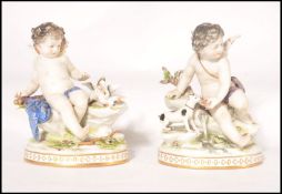 A pair of porcelain continental figurines of winge