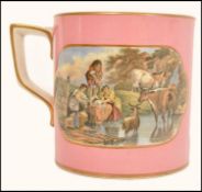A 19th century Prattware tankard cup having a pink