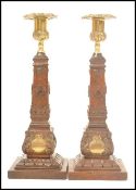 A pair of Masonic carved wooden souvenir candlesti