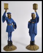 A pair of 19th century Victorian Lewis Carrol related candlesticks of the queen of hearts and the