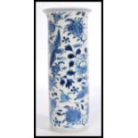 A 19th century Chinese blue and white vase of tall