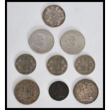 A group of silver coins dating from the 19th century to include a Victorian Crown 1897 , 1889 coin ,