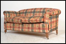 An  Edwardian drop arm sofa / daybed on square tap