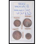 An early 19th century four coin set of George III 1800 Maundy coins. Largest measures 2 cm