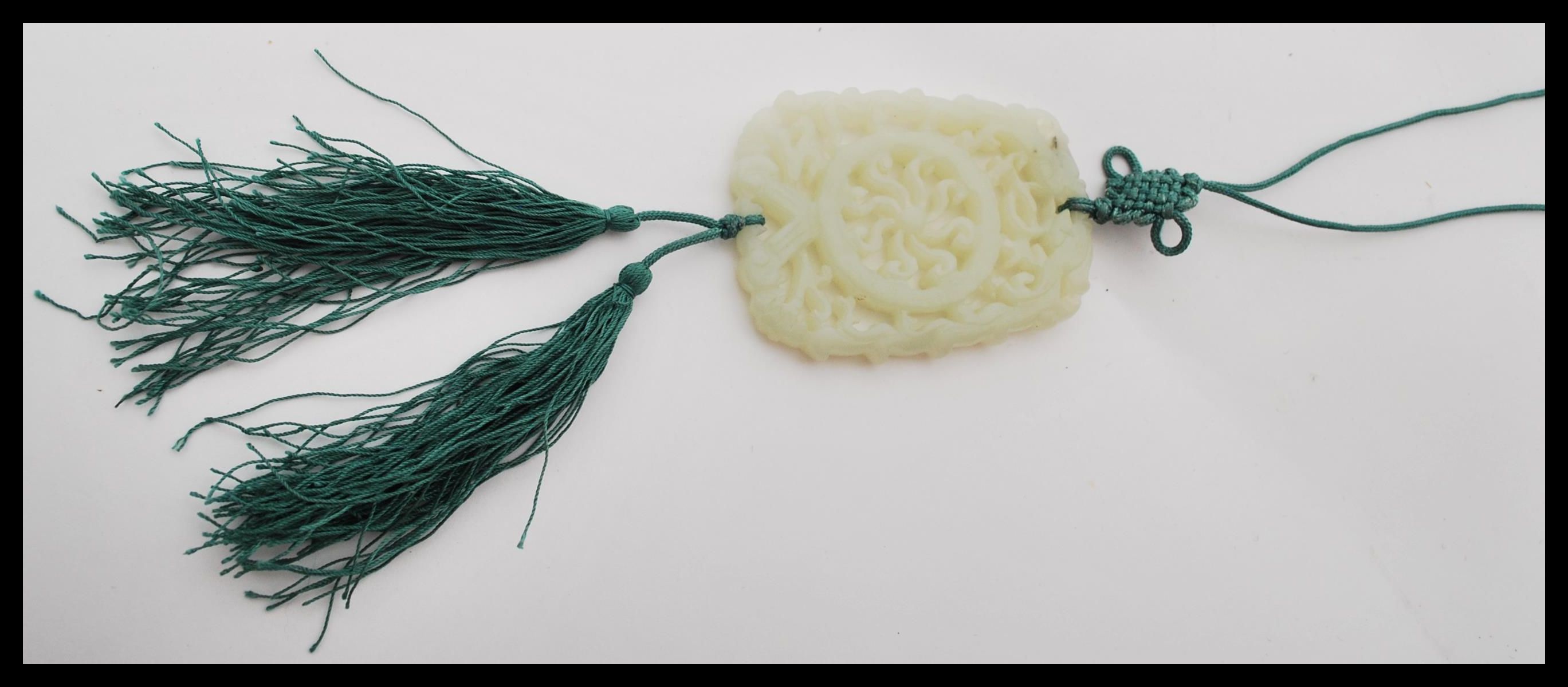 A Chinese carved jade double sided bi pendant havi - Image 2 of 5