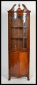 A good Georgian revival mahogany  bow fronted  display corner cabinet. Twin astragal glass doors