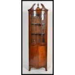 A good Georgian revival mahogany  bow fronted  display corner cabinet. Twin astragal glass doors