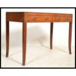 An Edwardian mahogany bow front writing table desk