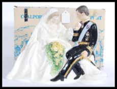 A believed prototype Coalport limited edition figurine of HRH The Prince of Wales and Lady Diana