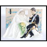 A believed prototype Coalport limited edition figurine of HRH The Prince of Wales and Lady Diana