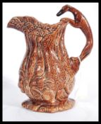 A 19th century Victorian relief jug depicting game