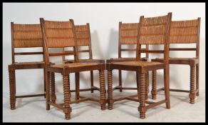 A set of country oak and rattan weave dining chair